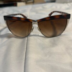 Miu Miu Tortoise Silver Frame.